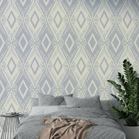 An angled shot of a wall with rhombus wallpaper

