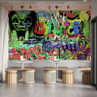 Trendy graffiti-inspired wall mural wallpaper for bold decor.