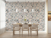 Pastel hued pebbles define the sophisticated vibrant multicolour terrazzo mural pattern.