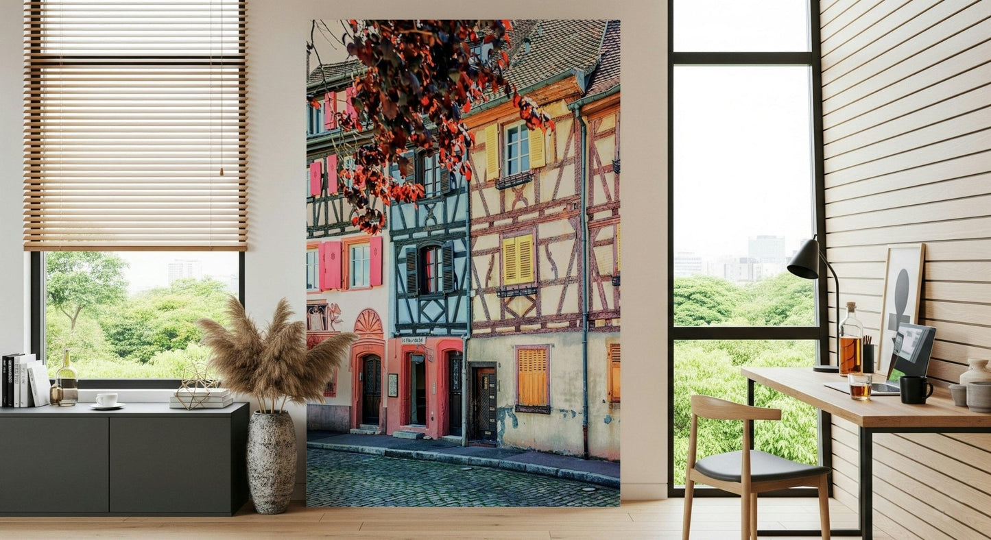 Vintage Alsace Wall Mural adds old-street character to a covered patio seating nook