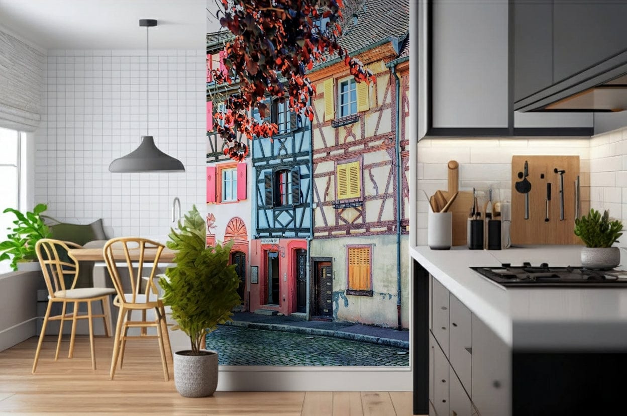 Vintage Alsace Wall Mural adds storybook street charm beside a modern kitchen
