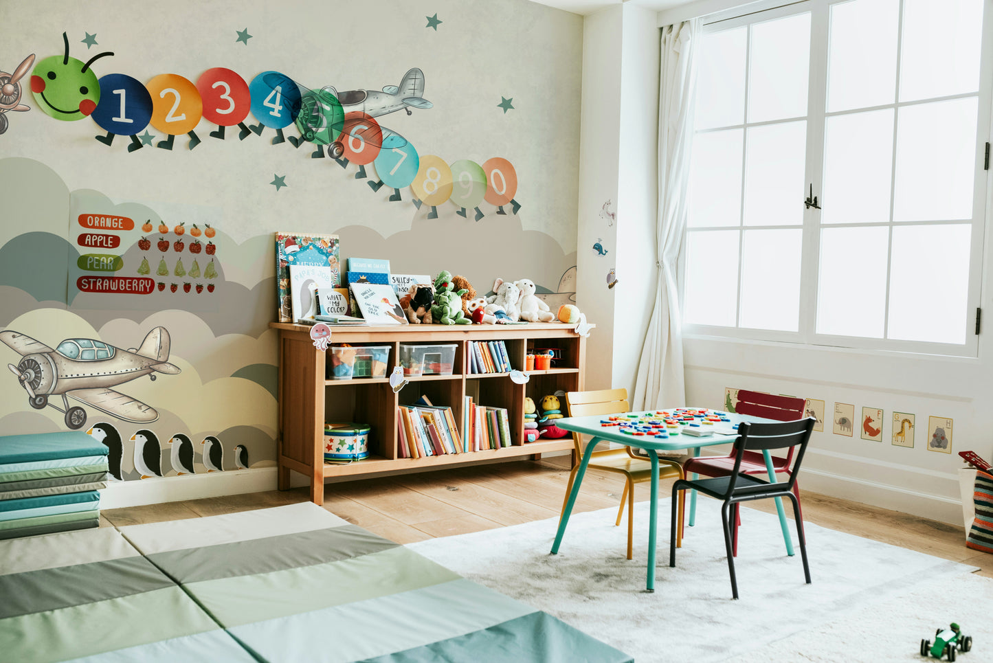 The design features a repeating pattern of soft, graceful planes and hot air balloons.

