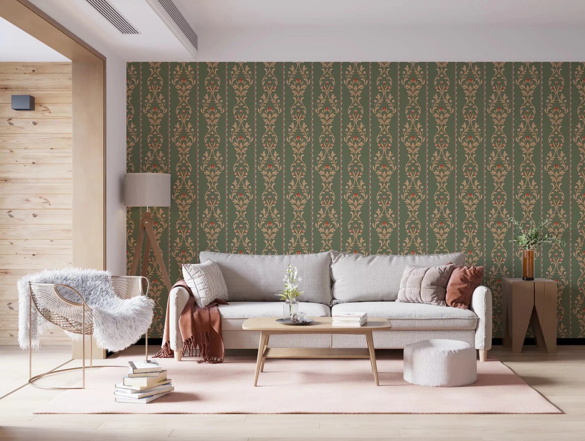 A pale sofa corner styled with Vintage Bloom heritage stripe Wallpaper and warm light