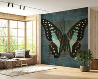 High resolution wall mural of a peaceful butterfly flight in a forest.