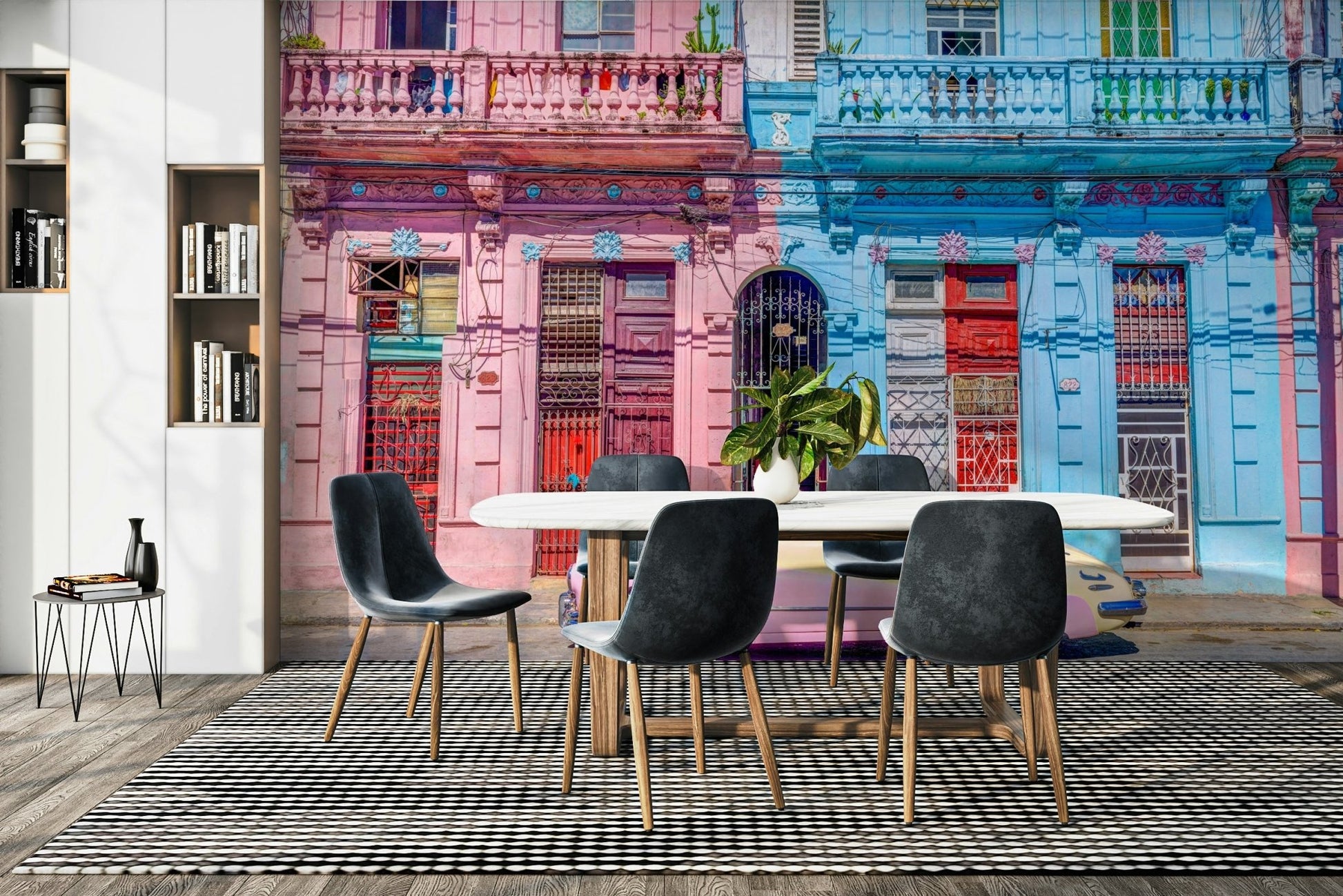 The street is lined with classic Cuban buildings.

