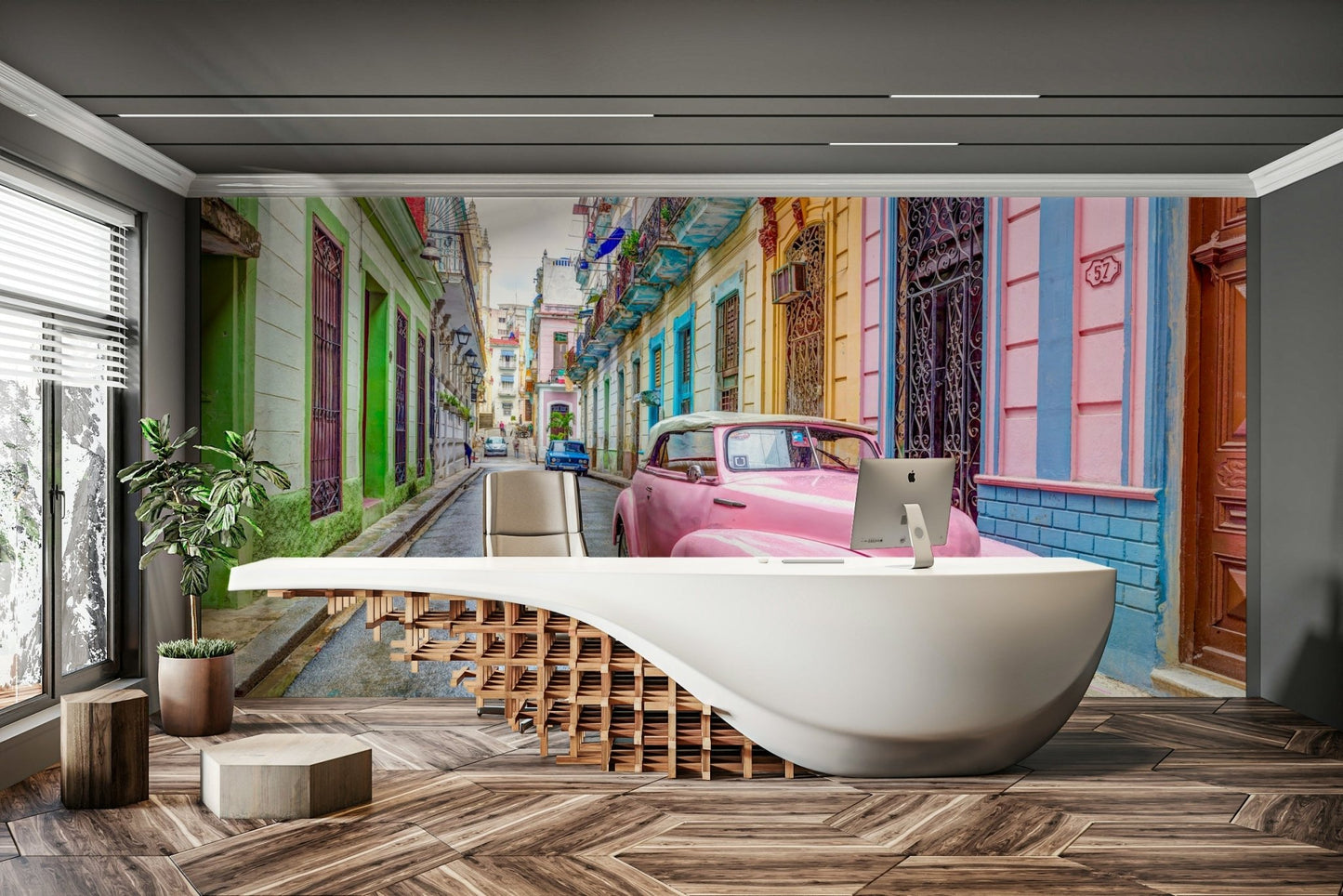 Vibrant street mural with antique car in Havana.

