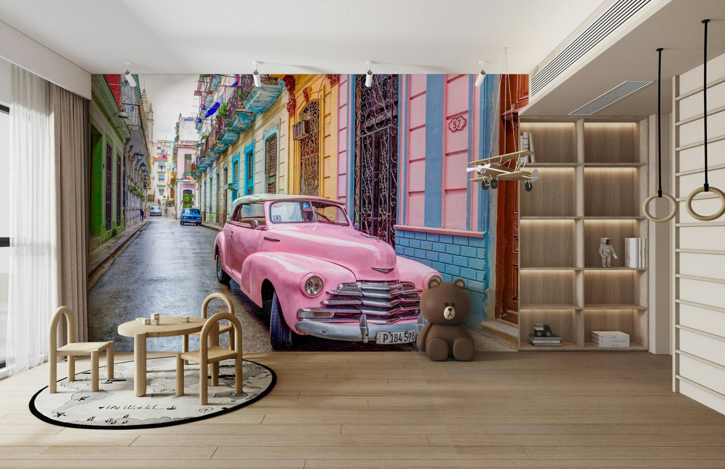 Colorful Havana mural with vintage automobile.

