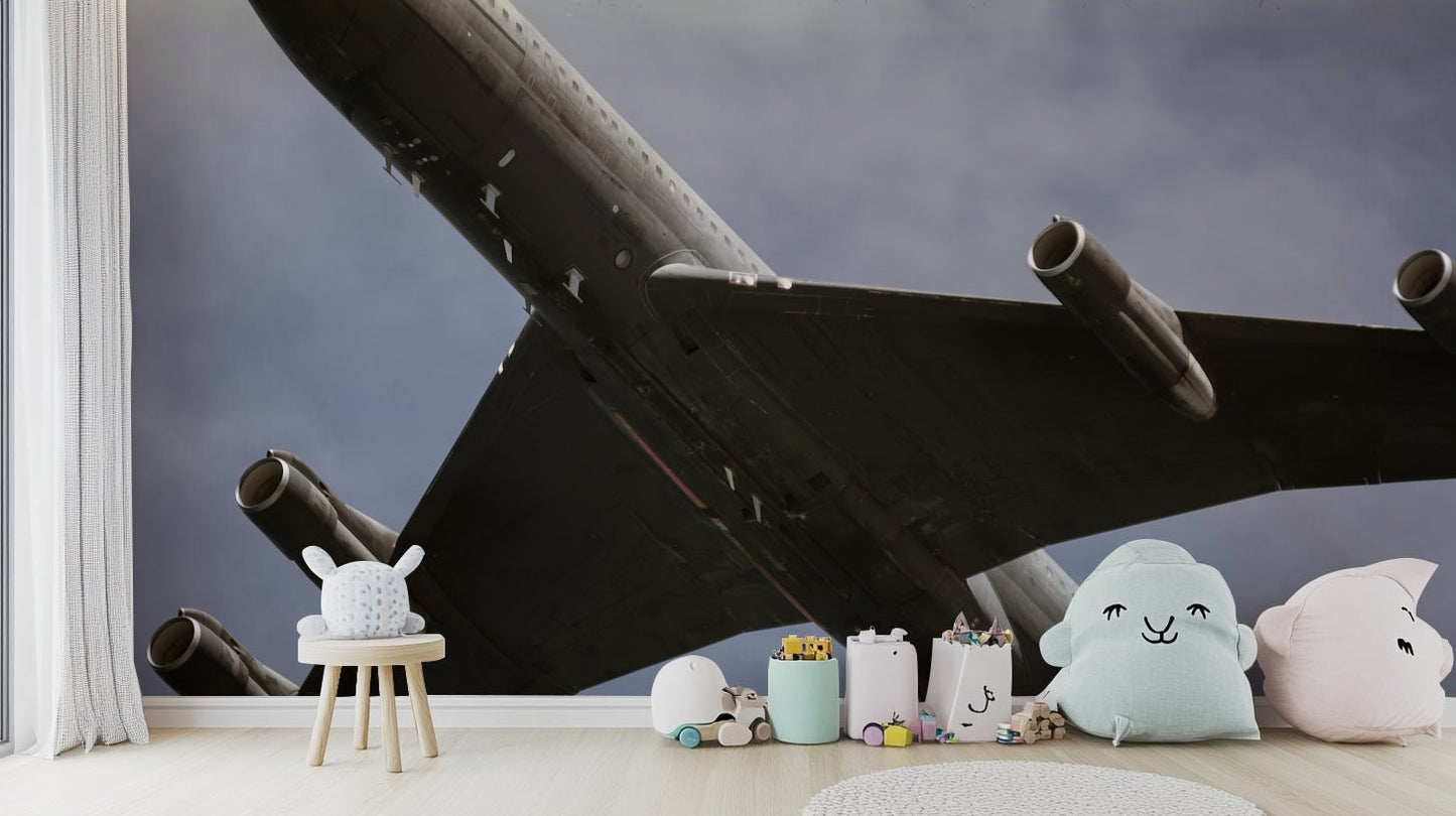 An artistic military plane mural on minimalist wallpaper.


