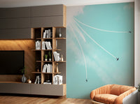 An artistic military plane mural on minimalist wallpaper.

