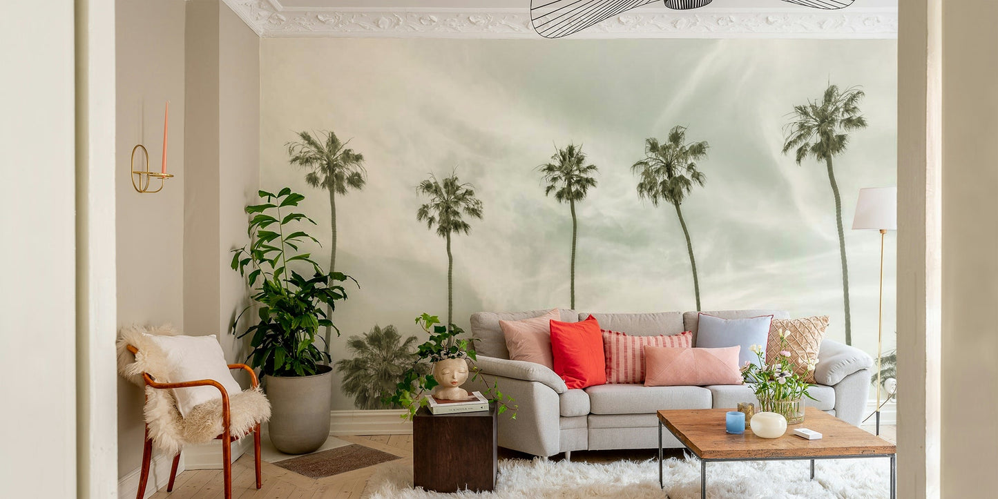 Artistic wall mural of palm trees in vintage coastal colors.

