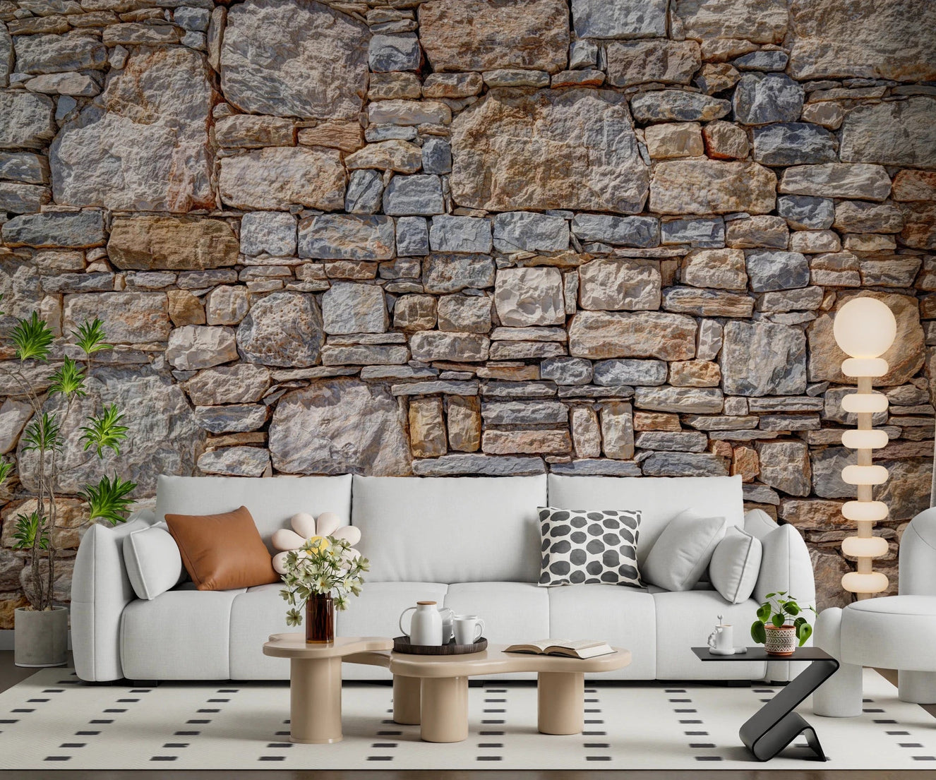 A stone-look backdrop gives this living room a grounded, rustic feel