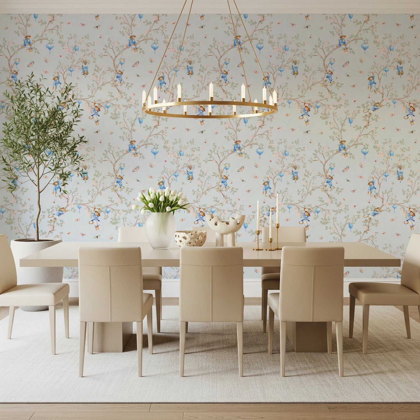 Dining room with blue monkey and sakura wallpaper and brass chandelier