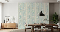 Delicate printed foliage shapes add texture to the Powder Blue Wallpaper pattern