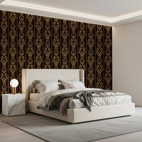 Soft bedroom scene with Vintage Vine Wallpaper behind a white bed and side lamps
