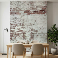 A cozy reading nook with the textured brick peel and stick mural., GD6099