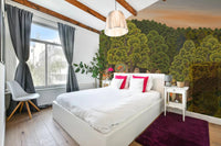 Sloped ceiling bedroom with Vrindavan Forest Gathering Wall Mural by the bed