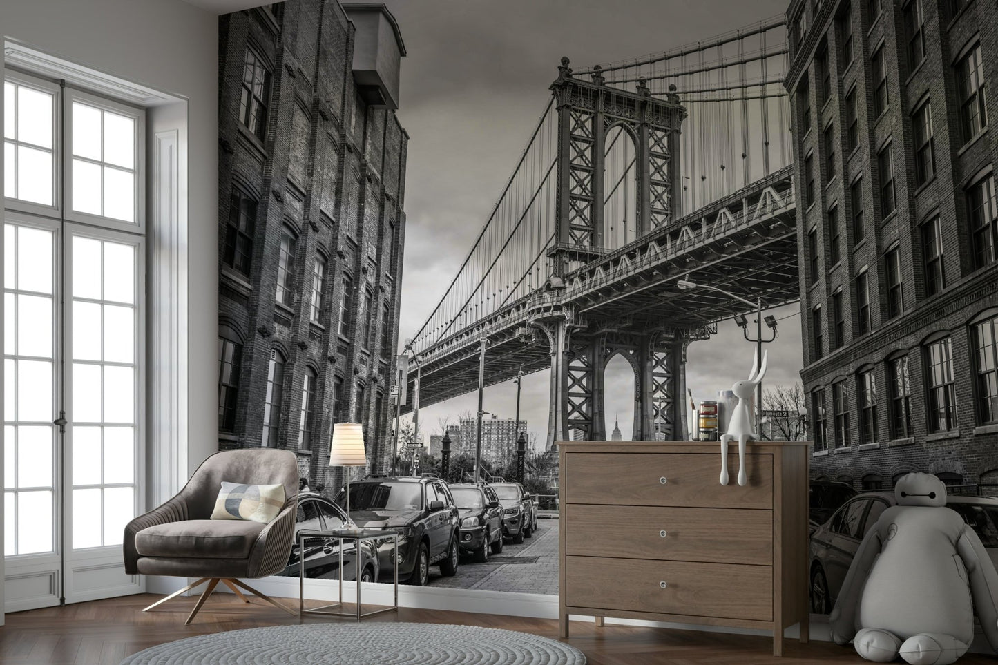 Old brick buildings with many windows line both sides of the street.

