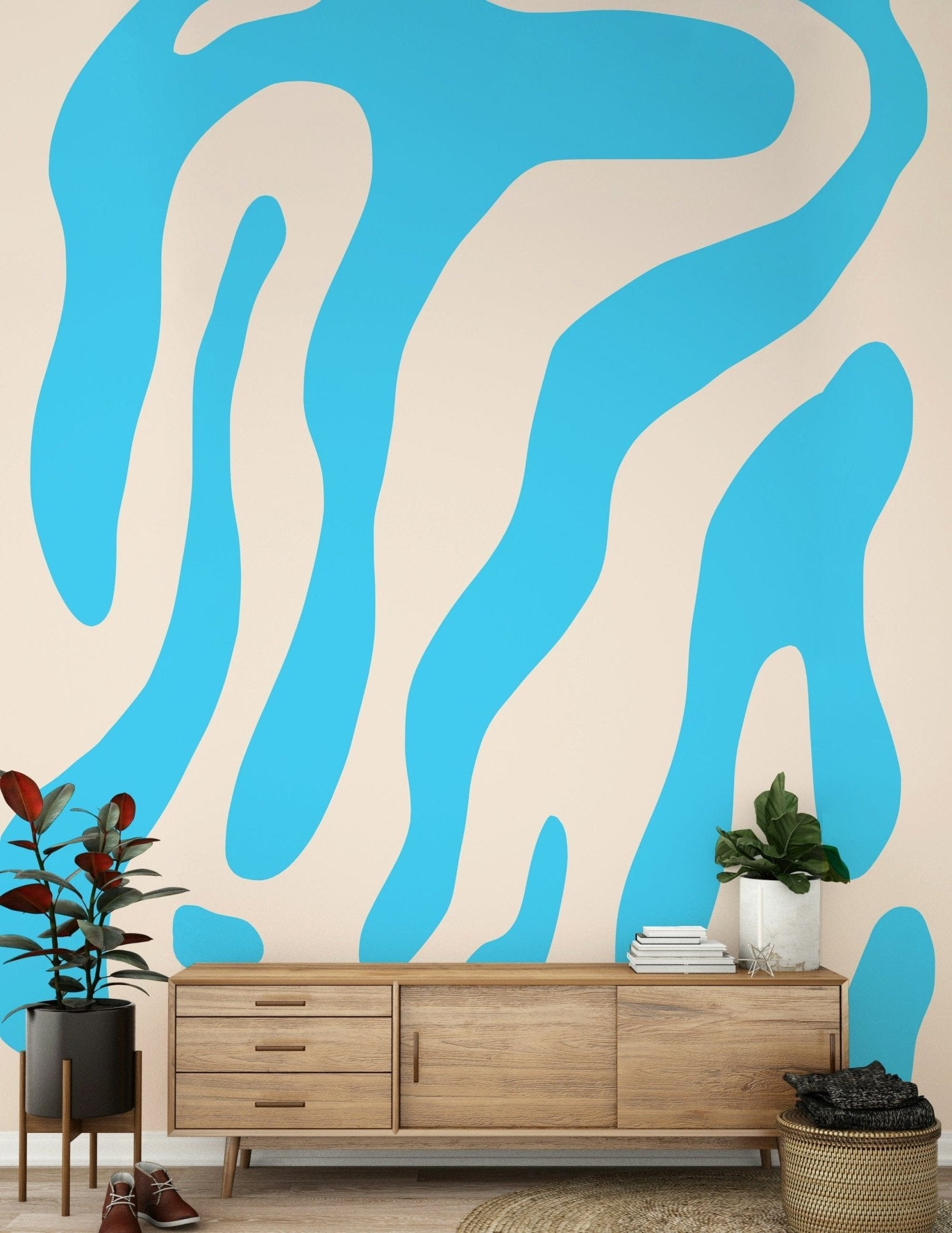 A hand applying the Water Wall dynamic liquid mural.