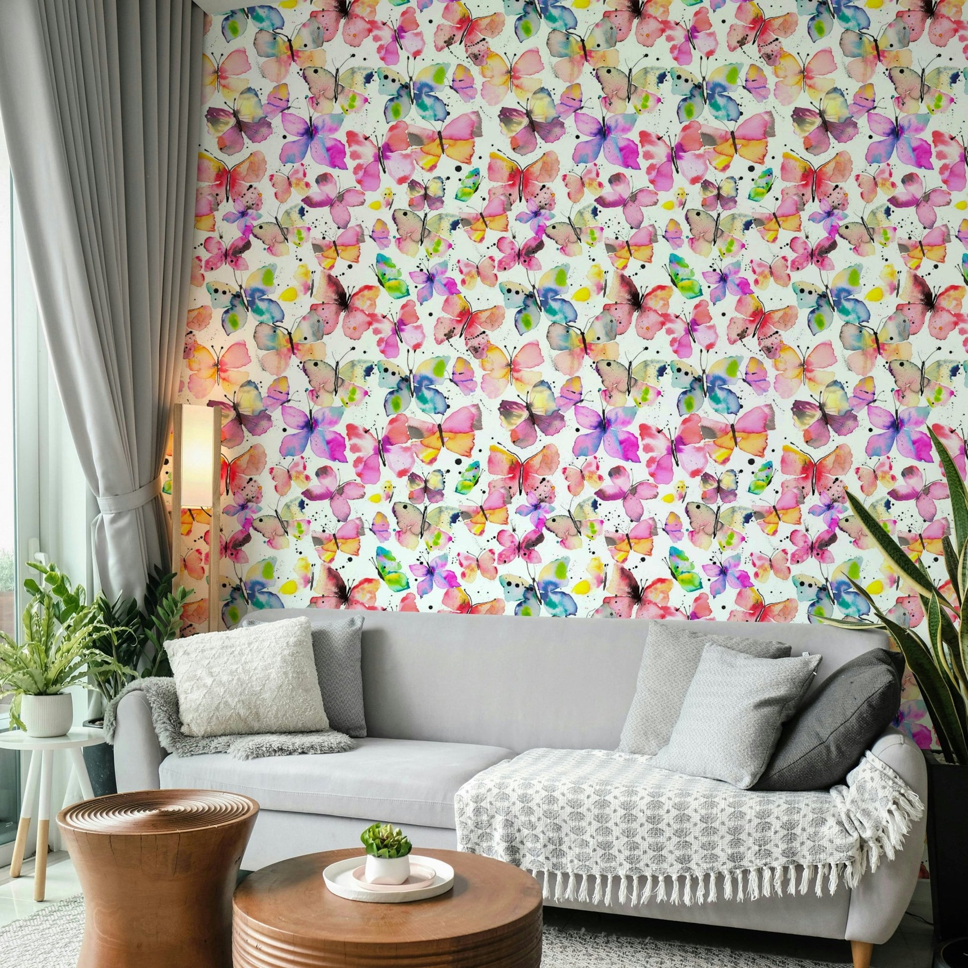 Hand-painted butterfly wall mural in pastel colors

