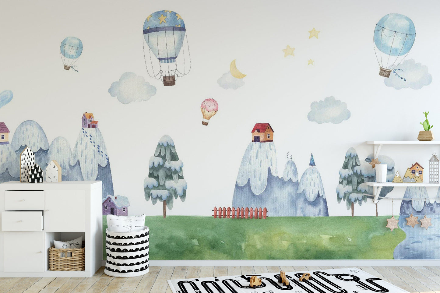 Children's wallpaper with whimsical mountains and homes
