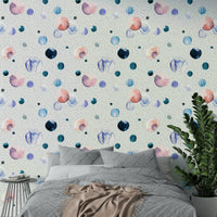 Subtle watercolor dots creating a speckled effect on walls

