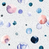 Calm watercolor dot design with a speckled space effect

