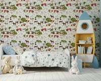 Playful lambs jumping across Watercolor Farm Life wallpaper for walls.