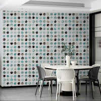 Soft blue watercolor dots in a Scandinavian wallpaper style.

