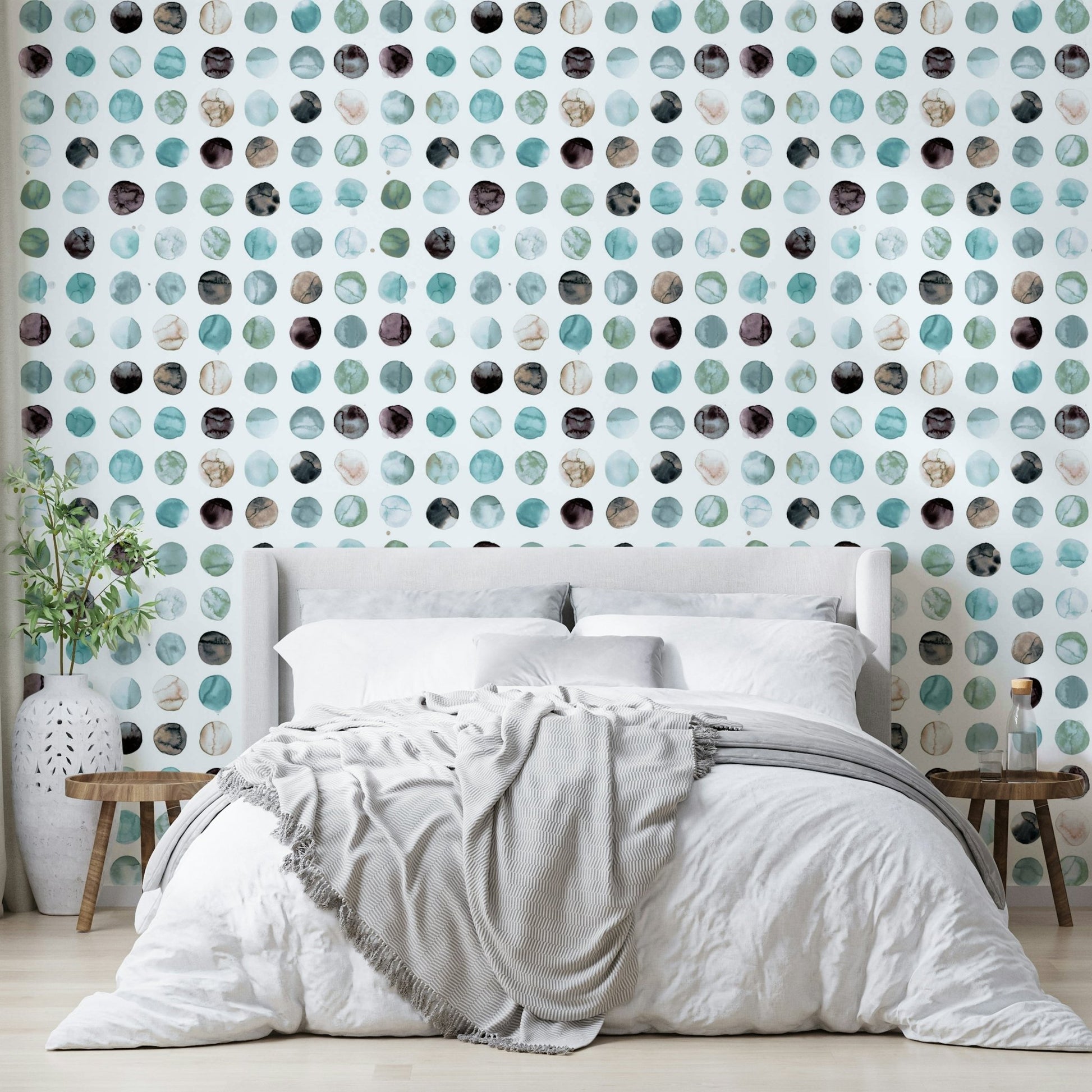 Aqua watercolor dots on a white minimalist wallpaper.

