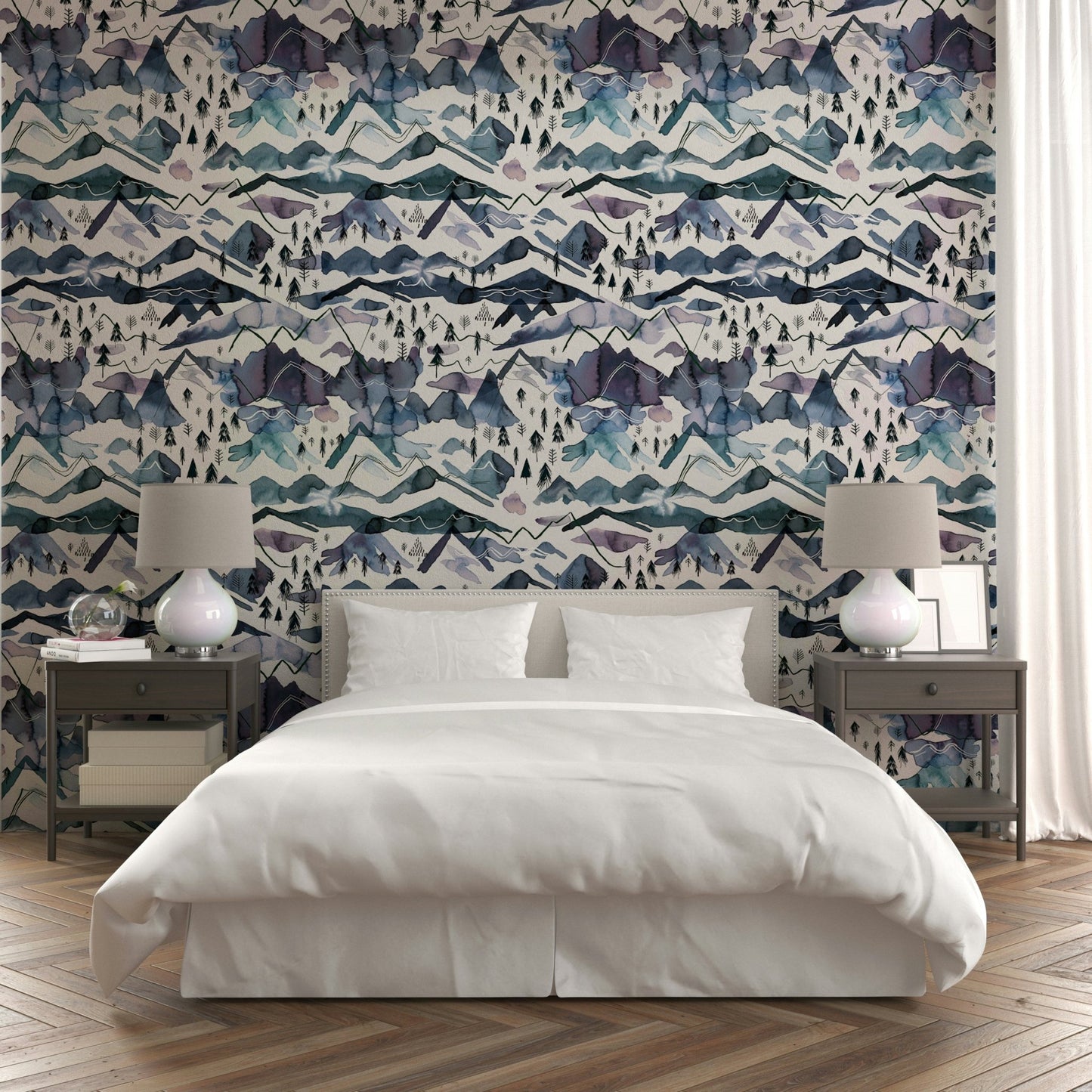 Serene watercolor mountain landscape with blue hues wallpaper.

