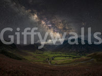 Astronomical mural with glowing galactic band

