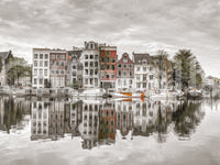 Wall decor with a picturesque urban scene.

