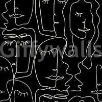 A seamless pattern of faces on a wall

