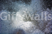 A tranquil subtle texture mural on the wallpaper.

