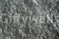 Spa-like bathroom with natural stone finish wall mural.