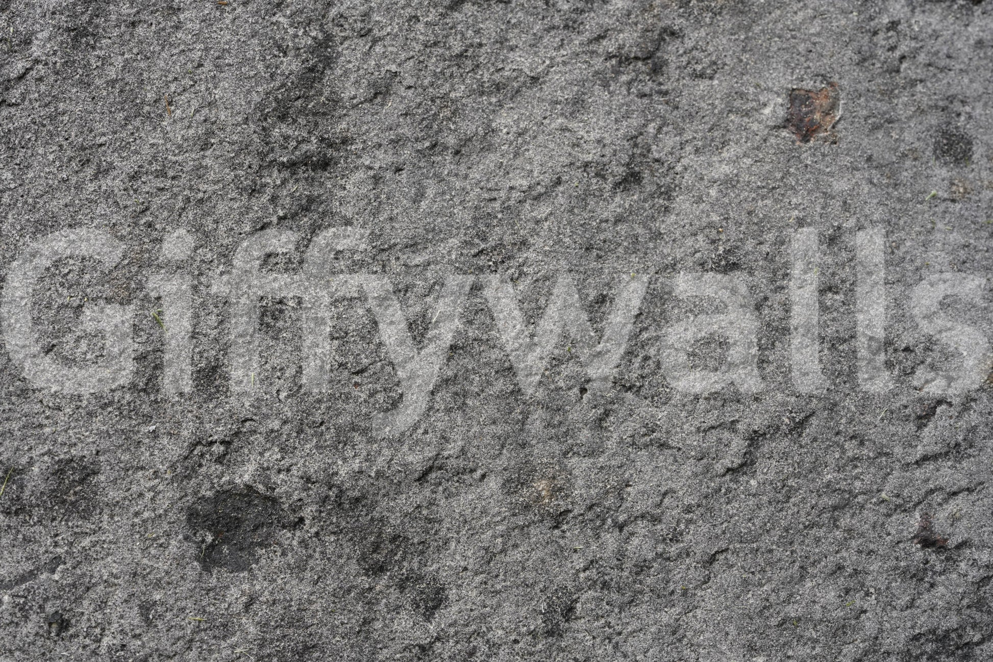 Corner view of gray peel and stick feature wall.