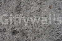 Corner view of gray peel and stick feature wall.