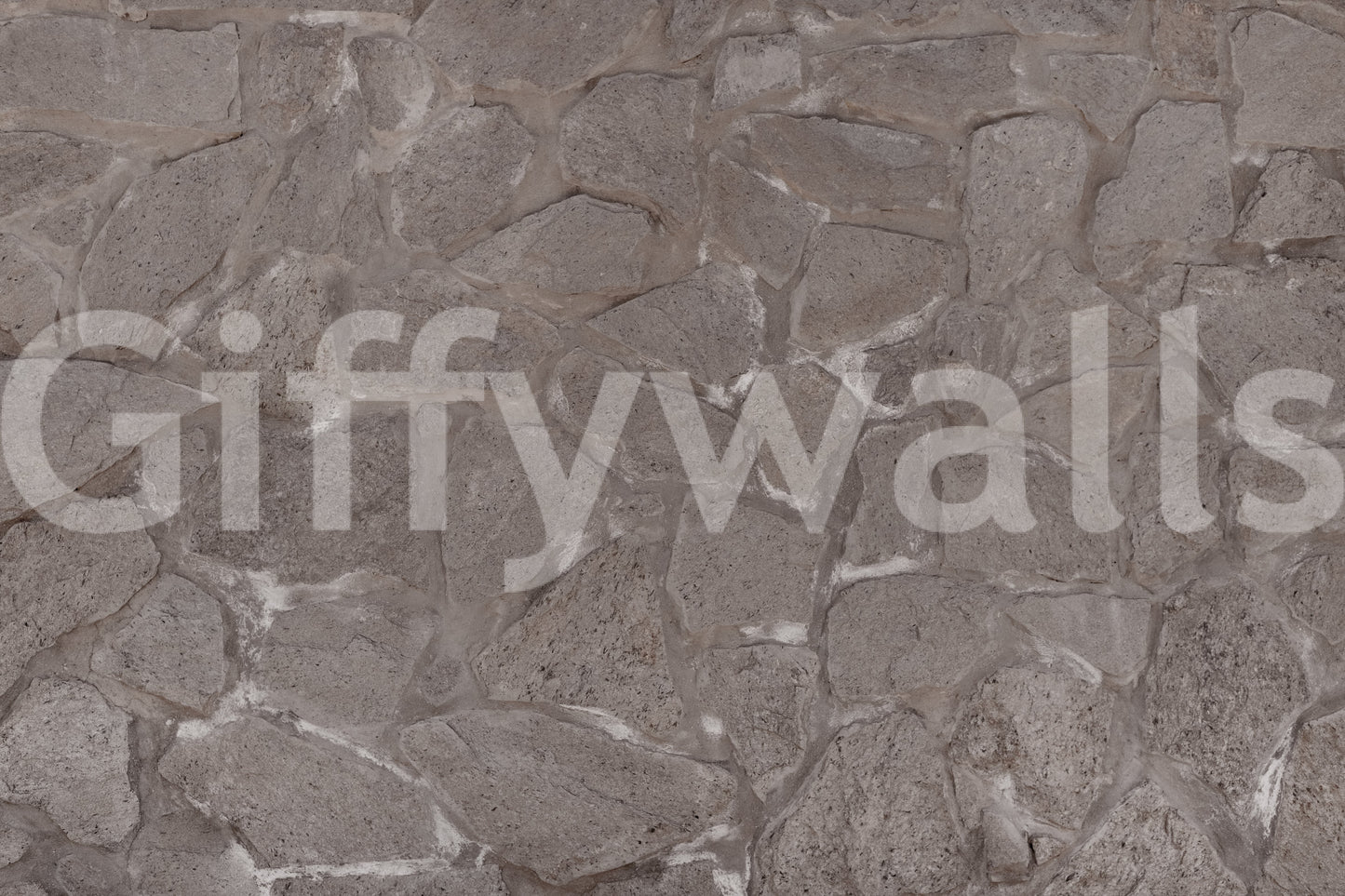 Rustic Stone wallpaper in a kitchen with white cabinets.