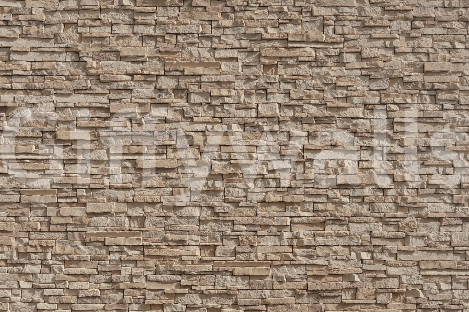 Textured Stone Cladding wallpaper on a living room wall.