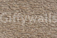 Textured Stone Cladding wallpaper on a living room wall.