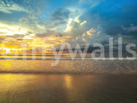 Wall mural of a serene beach with bright sky colors.