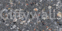Wall mural showcasing mixed stone fragments on a dark surface.
