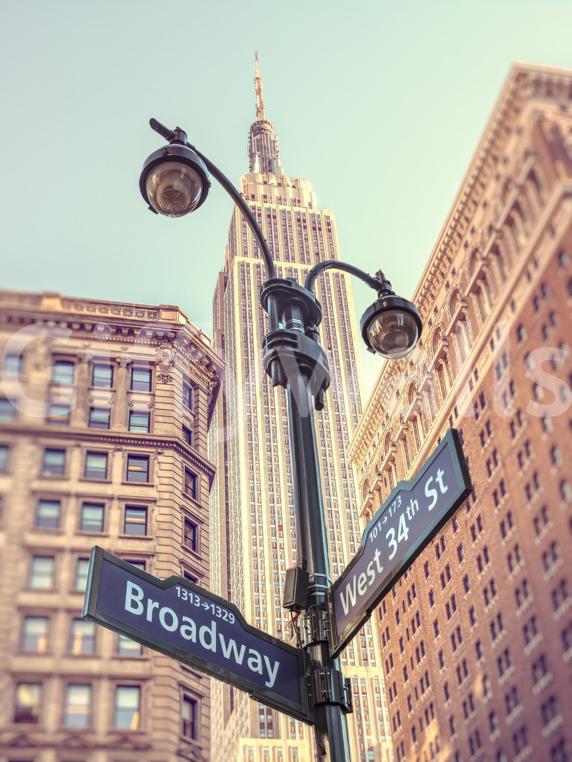Classic Empire State Building mural, sepia tone finish wallpaper option.