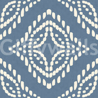 Outer rings of cream dots frame the larger diamond on this canvas slate wallpaper.