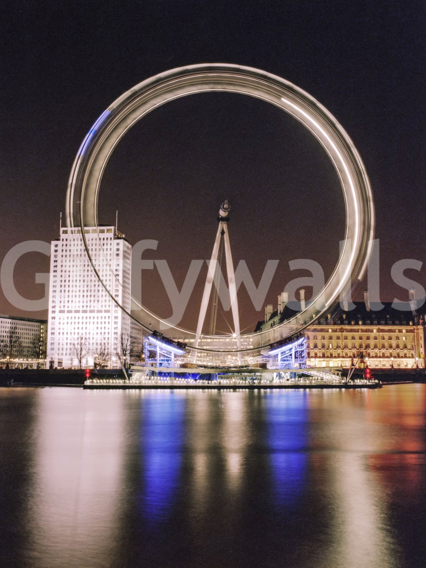 Long exposure London Eye ring lit against near-black sky wall mural, GD9704