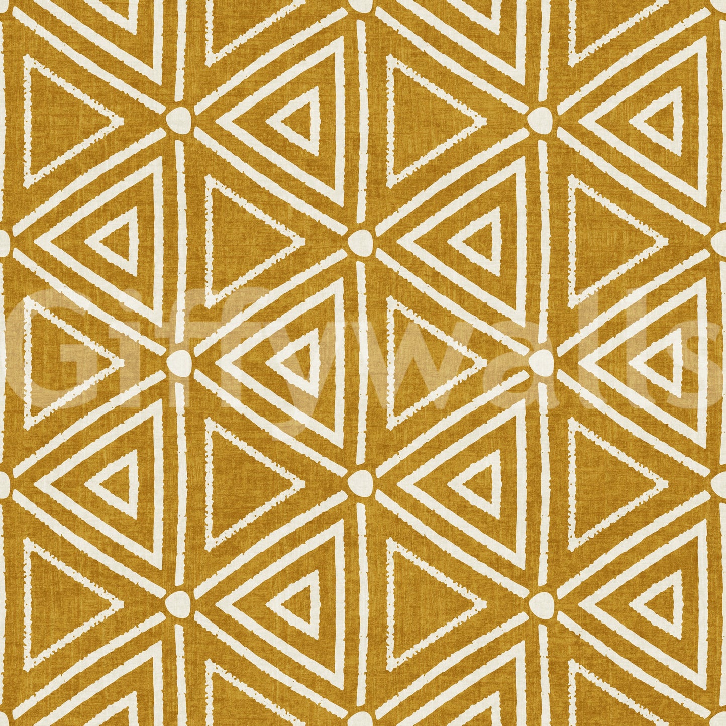 Mudcloth wallpaper layering chalky triangles and small dots on a mustard ground.