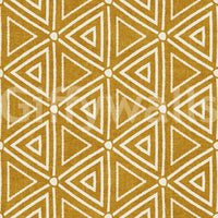 Mudcloth wallpaper layering chalky triangles and small dots on a mustard ground.