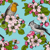 Birds and blossoms repeat pattern wallpaper with robin and titmouse on powder blue background.