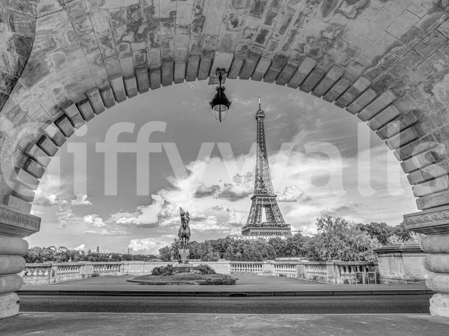 Grey color timeless wall mural with Eiffel Tower and clouds.
