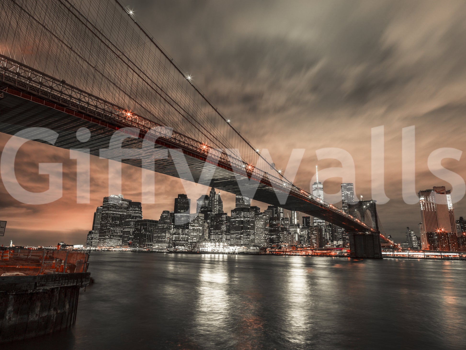 Urban bridge wall mural with glowing windows and a dramatic sunset sky background.